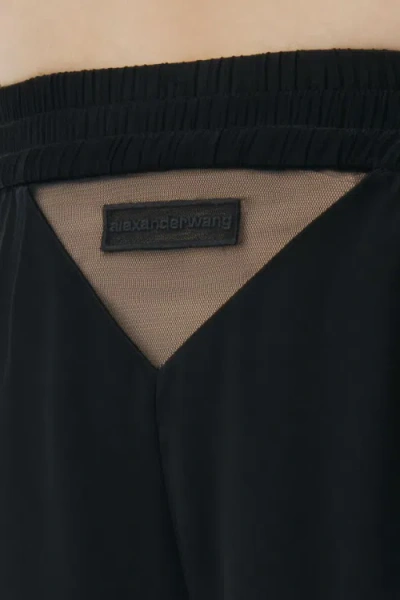 Shop Alexander Wang Logo Cutout Boxer Trousers In Black