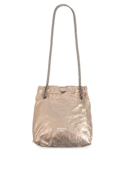 Shop Balenciaga Small Crush Metallic Drawstring Tote Bag In Gold