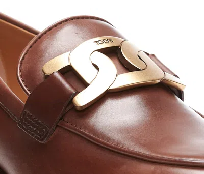 Shop Tod's Flat Shoes In Brown