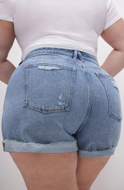 Shop Good American Good Girlfriend Mid Rise Denim Shorts In Indigo