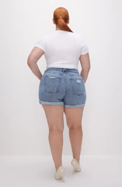 Shop Good American Good Girlfriend Mid Rise Denim Shorts In Indigo