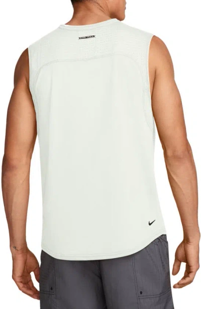 Shop Nike Dri-fit Solar Chase Trail Running Sleeveless T-shirt In Summit White/ Lilac Bloom