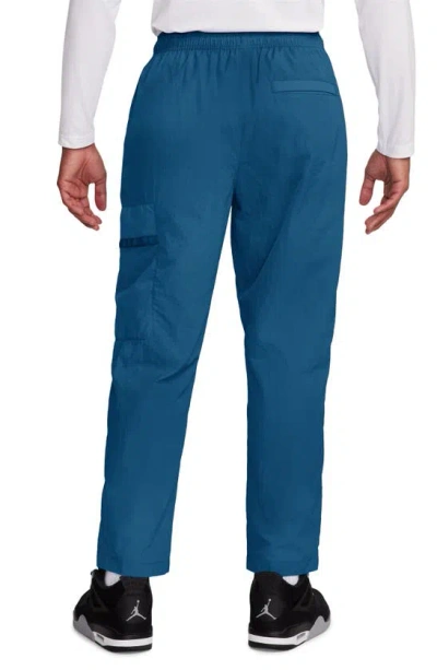 Shop Jordan Woven Cargo Pants In Industrial Blue/ White