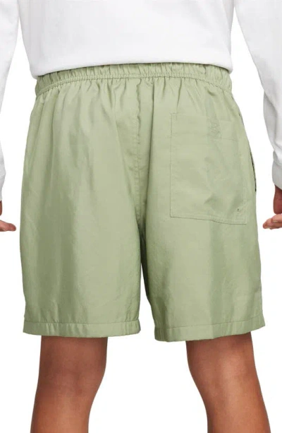 Shop Nike Club Woven Flow Shorts In Oil Green/ White