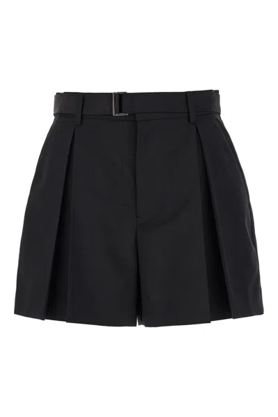 Shop Sacai Belted Pleated Shorts In Black