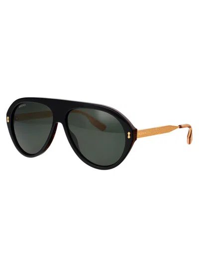 Shop Gucci Sunglasses In 001 Black Gold Grey