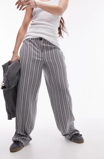 Shop Topshop Stripe Low Rise Wide Leg Pants In Grey
