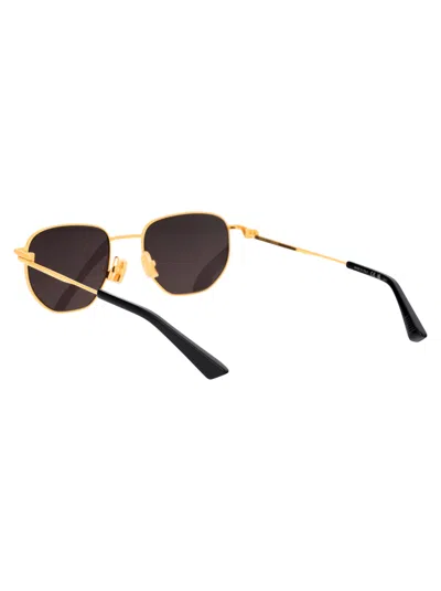 Shop Bottega Veneta Bv1301s Sunglasses In 001 Gold Gold Grey