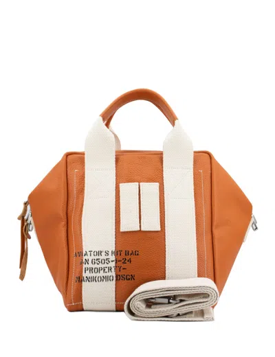 Shop Manikomio Dsgn Shoulder Bag In Orange