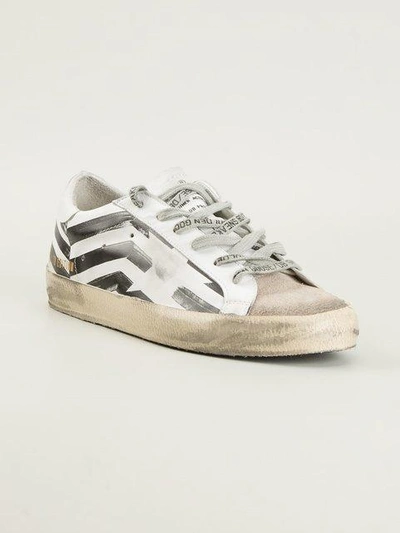 Shop Golden Goose Distressed Trainers
