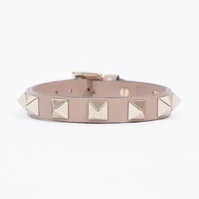 Shop Valentino Rockstud Bracelet Poudre Calfskin Leather In Gold