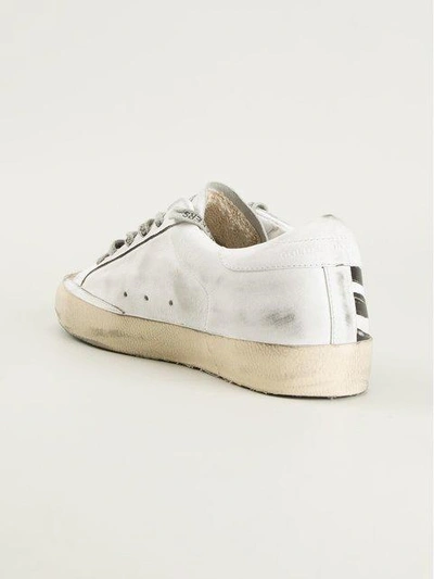 Shop Golden Goose Distressed Trainers