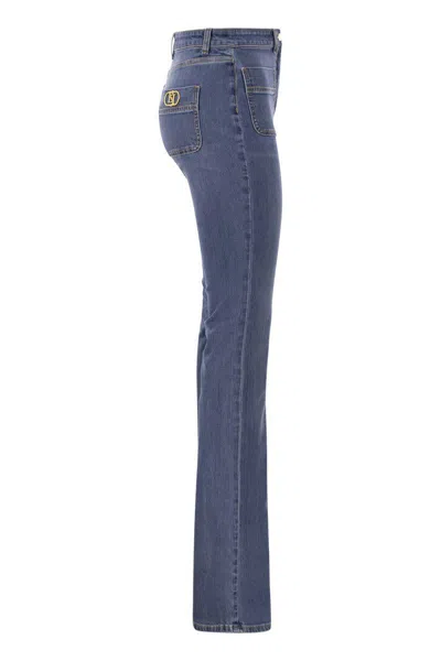 Shop Elisabetta Franchi Paw Jeans With Logo Plates In Medium Denim