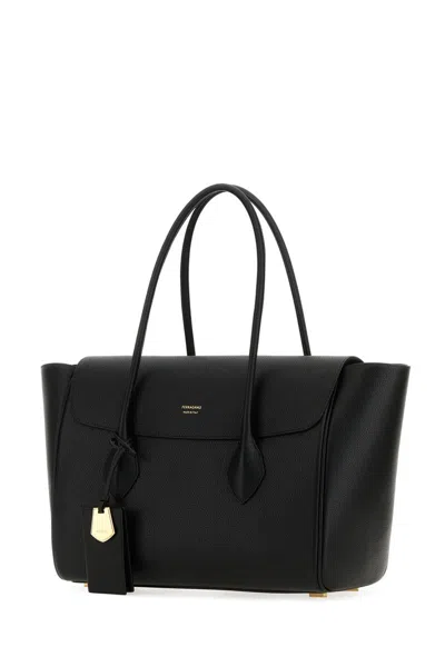 Shop Ferragamo Salvatore  Handbags. In Black Black