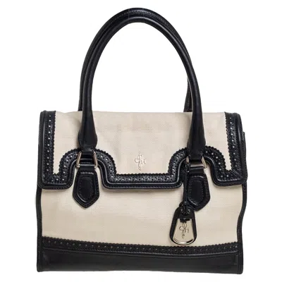 Shop Cole Haan Canvas And Wingtip Leather Flap Brooke Tote In Black