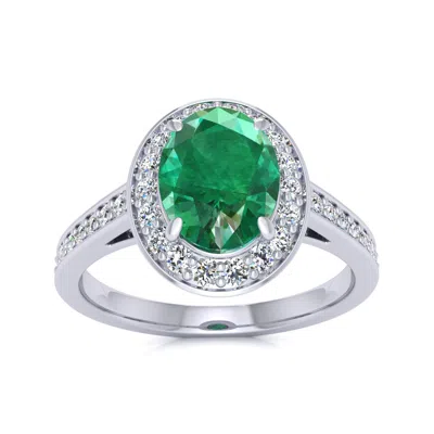 Shop Sselects 1 1/2 Carat Oval Shape Emerald And Halo Diamond Ring In 14 Karat White Gold In Green