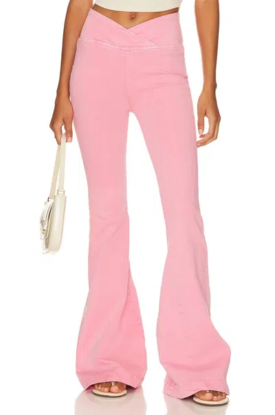 Shop Free People Venice Beach Flare Jeans In Peony In Pink