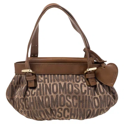 Shop Moschino Monogram Canvas And Leather Tote In Beige
