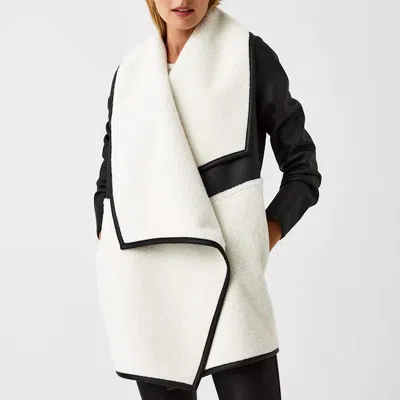 Shop Spanx Fleece & Faux Leather Long Wrap Jacket In Black & Snow In White