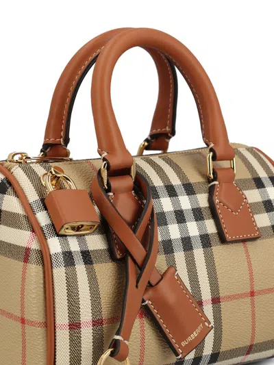 Shop Burberry Handbags In Vntg Chk/briar Brown