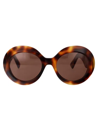 Shop Gucci Sunglasses In 009 Havana Havana Brown