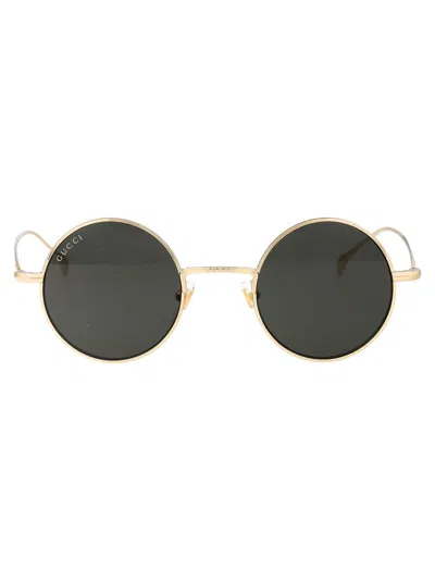 Shop Gucci Sunglasses In 007 Gold Gold Grey