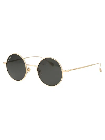 Shop Gucci Sunglasses In 007 Gold Gold Grey