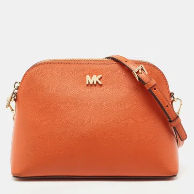 Shop Michael Michael Kors Leather Medium Logo Dome Crossbody Bag In Orange
