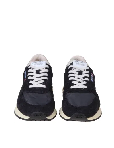 Shop Autry Reelwind Running Sneakers In Suede And Nylon In Black