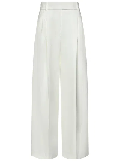 Shop Alexandre Vauthier Trousers In White