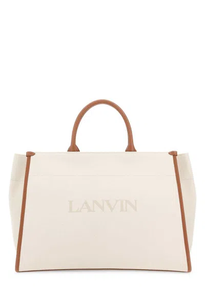 Shop Lanvin Handbags. In Beige O Tan