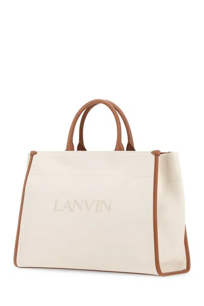 Shop Lanvin Handbags. In Beige O Tan