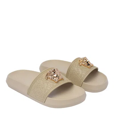 Shop Versace Sandals In Golden