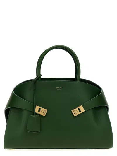 Shop Ferragamo 'hug Medium' Handbag In Green