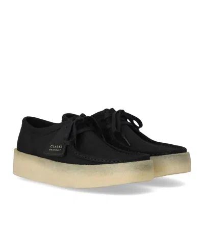 Shop Clarks Wallabee Cup Black Loafer