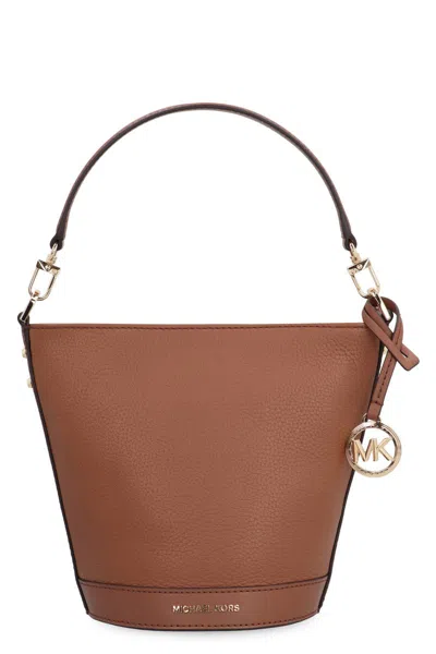 Shop Michael Kors Townsend Leather Bucket Bag In Saddle Brown