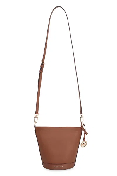 Shop Michael Kors Townsend Leather Bucket Bag In Saddle Brown