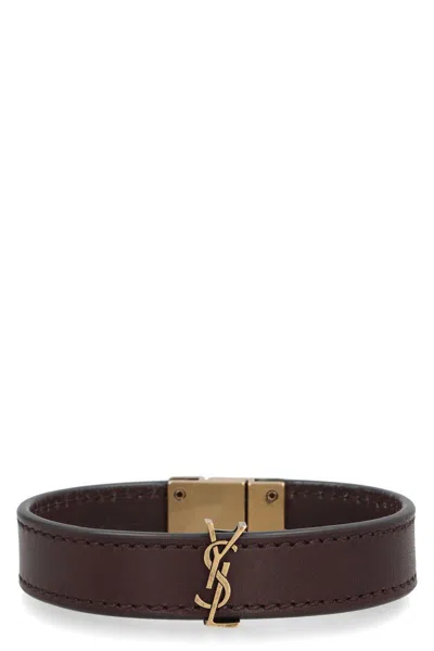 Shop Saint Laurent Cassandre Leather Bracelet In Brown