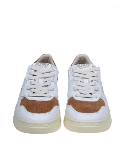 Shop Autry Leather And Suede Sneakers In White/caramel