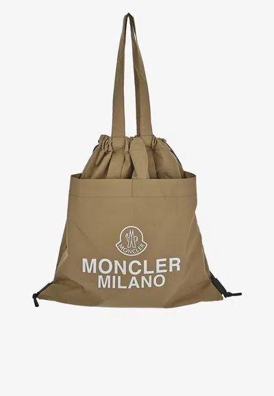 Shop Moncler Aq Drawstring Tote Bag In Beige