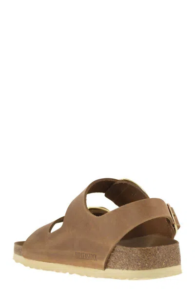 Shop Birkenstock Milano Big Buckle - Oiled Leather Sandal In Cognac