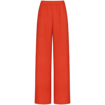 Shop Valentino Pants In Orange