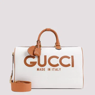 Shop Gucci Beige Duffle Logo Canvas Handbag In Nude & Neutrals
