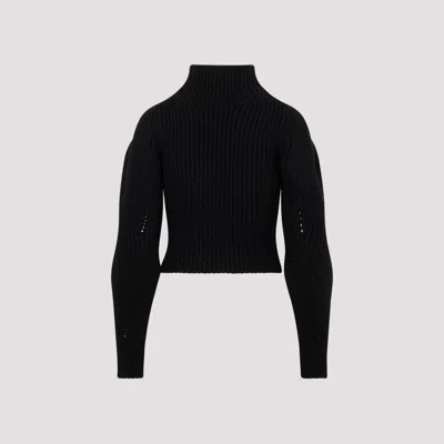 Shop Alaïa Black Rib High Neck Wool Sweater