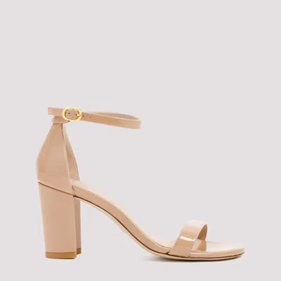 Shop Stuart Weitzman Nude Patent Leather Nearlynude Sandals In Nude & Neutrals