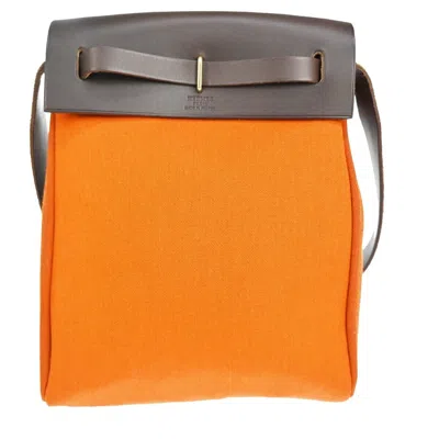 Shop Hermes Hermès Herbag Orange Canvas Shoulder Bag ()