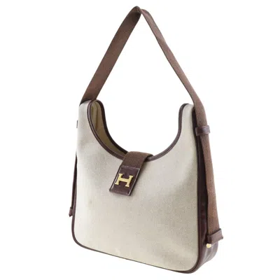 Shop Hermes Hermès Tsako Beige Canvas Shoulder Bag ()