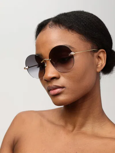 Shop Cartier Sunglasses Woman Gold Woman