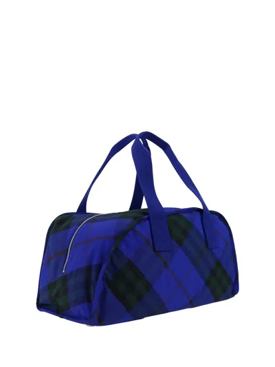 Shop Burberry Travel Bags In Blue