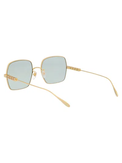 Shop Gucci Sunglasses In 003 Gold Gold Green